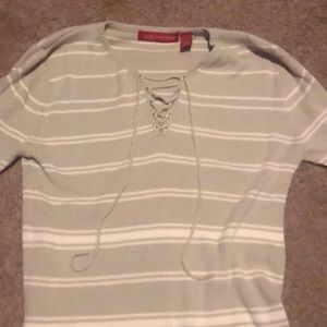 Cream colored long sleeve top